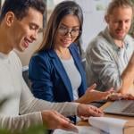 A startup business team working on a project together.