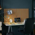 A modern home office setup featuring a wooden desk.