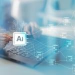 AI branching out graphics over a person using a laptop to illustrate data integration.