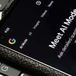 The AI Mode is turned on in the Google app on the screen of a smartphone. AI Mode helps users search more effortlessly by combining the capabilities of Gemini 2.0