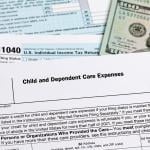 A 'child and dependent care expenses form on top of other US tax documents.
