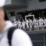 Sailors disembark from the USS Carl Vinson after returning from deployment to their homeport at Naval Air Station North Island in Coronado, California.