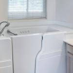 A square walk-in bathtub with elderly and handicapped accessibility.