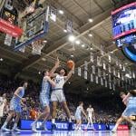 Cameron Boozer #12 of the Duke Blue Devils posts up against Henri Veesaar #13 of the North Carolina Tar Heels during the second half of the game at Cameron Indoor Stadium on March 07, 2026 in Durham, North Carolina. 