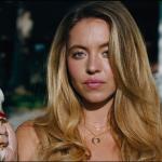 Sydney Sweeney holding an ice cream cone
