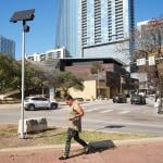 A surveillance camera is seen in the median of West Cesar Chavez Street at Lavaca Street next to Austin City Hall in Texas.