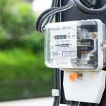 An electric meter measuring power for energy costs.