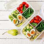 Vegetarian meals with eggs in containers.