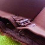 Close up on the clasp of a front-close bra.