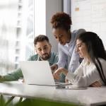 A group of work colleagues discussing about business strategies.
