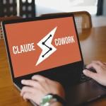 A person using the Claude Cowork platform while working at a cafe.