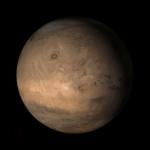 An Image from NASA showing the Tharsis face of Mars, a vast volcanic plateau centered near the equator in the western hemisphere of the planet.