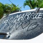 'Just married' written on a car window.