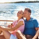 A couple enjoying their vacation time in a yacht trip.