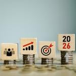 Wooden blockes with team forecast and 2026 growth goals graphics as a concept of economic forecast.