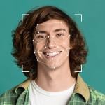 A young man illustrated with a face recognition graphic as a concept of deepfakes.