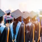 University graduating students lined up during commencement day.