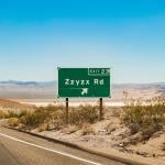 Zzyzx Rd sign at Interstate 15 freeway from Los Angeles, California to Las Vegas, Nevada in USA.