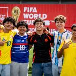 Fans posing for a photo during the FIFA World Cup Trophy Tour 2026 in Miami, Florida, USA.