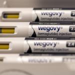 A stack of 2.4mg Wegovy injection pens