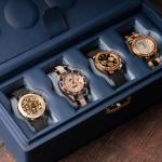Four rolex watches in a luxury case.