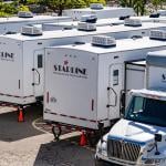 A view of Starline Production rental trucks and trailers.