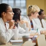Medical students listening to a lecture at a university.