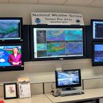 A meteorologist's work station monitoring hurricane alerts in Florida.