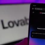 The Lovable AI app with a background of their logo.