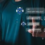 A person utilizing an AI chatbot that responds to online messages or inquiries.