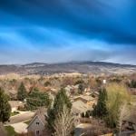 Aerial view of residential homes among the rocky mountains in Boise, Idaho.