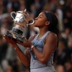 Coco Gauff lifting her 2025 French Open trophy