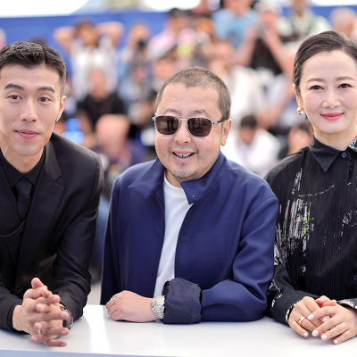 Zhou You, Jia Zhangke and Zhao Tao attend the "Caught By The Tides" Photocall at Cannes.