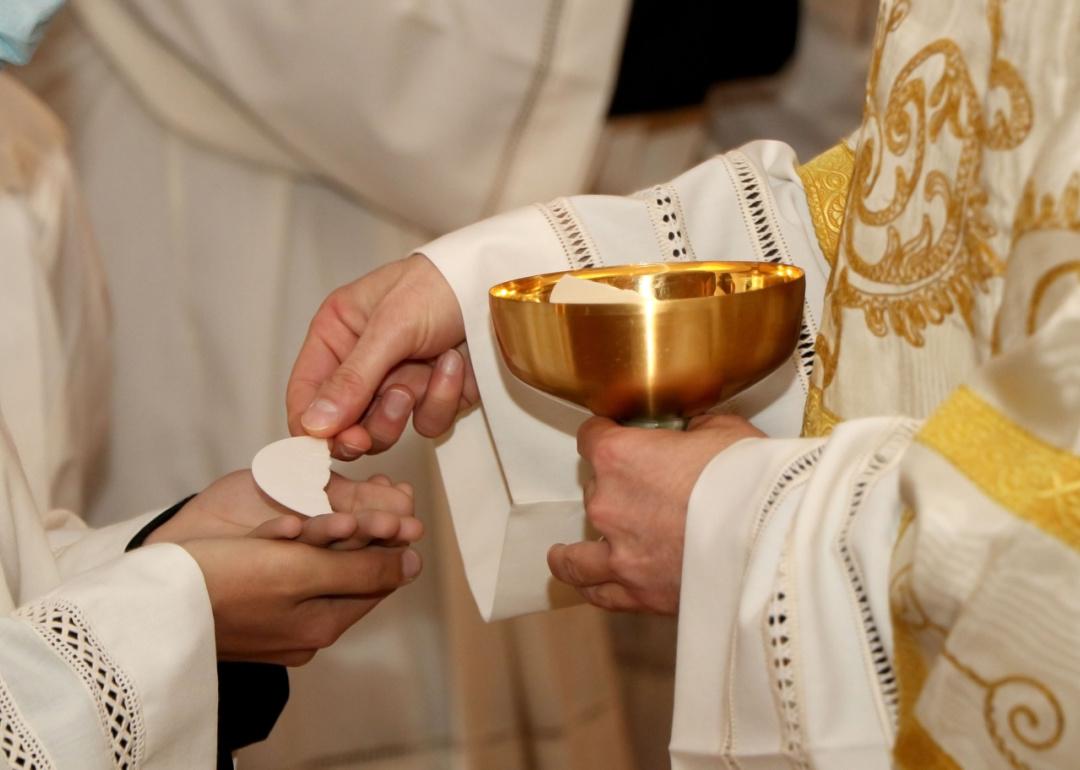 Communion rite during Catholic mass.