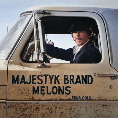 Charles Bronson sitting in the cab of a truck in ‘Mr. Majestyk’.