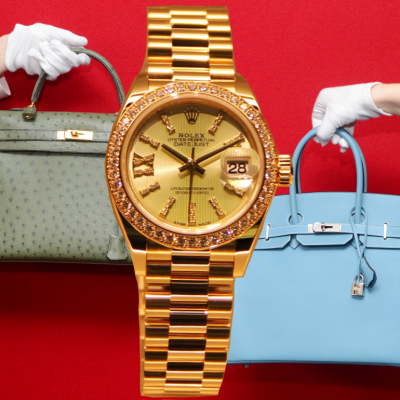 Gold Rolex watch with Hermes Birkin and Hermes Kelly handbags.