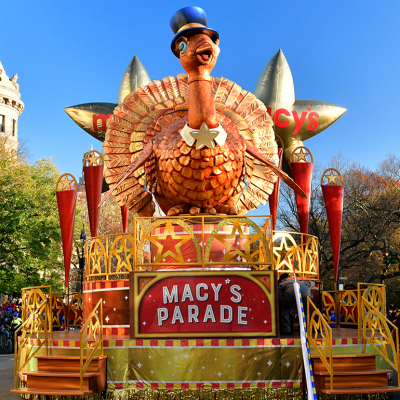 Tom Turkey, a large, gilded turkey statue upon a float with the words, Macy's Parade, waiting for the parade to start during the 96th Macy's Thanksgiving Day Parade in 2022.