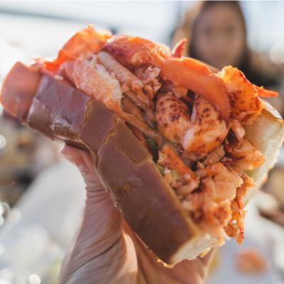 Closeup of a hot lobster roll, the signature dish of Connecticut