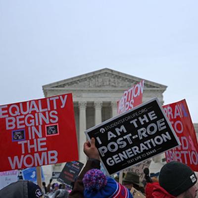 Pro-life activists march in front of the Us Supreme Court during the 49th annual March for Life, on January 21, 2022, in Washington, DC.