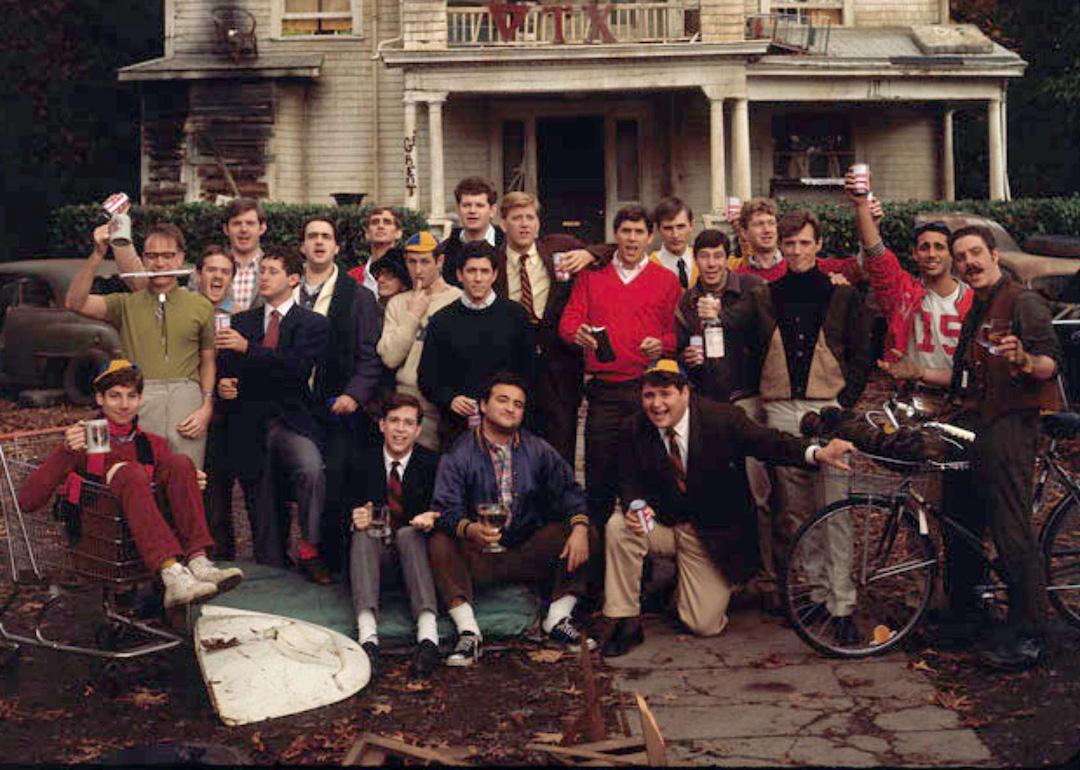 The cast of "National Lampoon's Animal House" in front of the Delta Tau Chi fraternity house at Faber College.