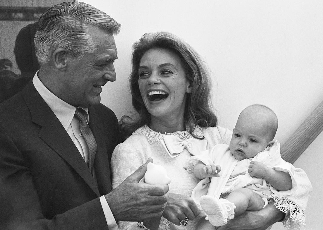 Cary Grant, fourth wife Dyan Cannon, and their daughter Jennifer, age 3 months old, just before boarding the SS Oriana, bound for England, to visit Grant's mother in 1965.