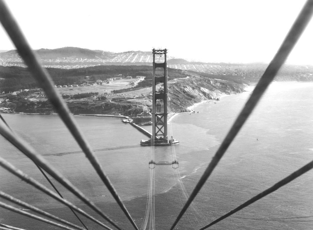 Cables suspended on the Golden Gate Bridge between the towers before being bound together to support the roadbed that will hang below them, San Francisco, California, circa 1935.