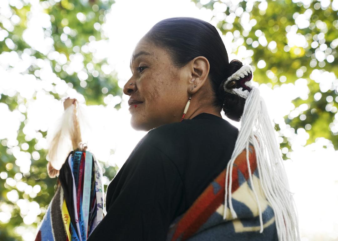 Seraphine Warren, a Native American woman who grew up on the Navajo Nation and now lives in Salt Lake City, stands for portraits on October 12, 2022, in Washington, D.C.