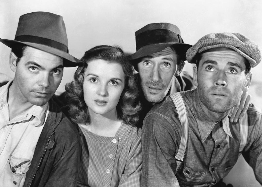 Actors Eddie Quillan, Dorris Bowden, John Carradine, and Henry Fonda in the 1941 film 'The Grapes of Wrath.'
