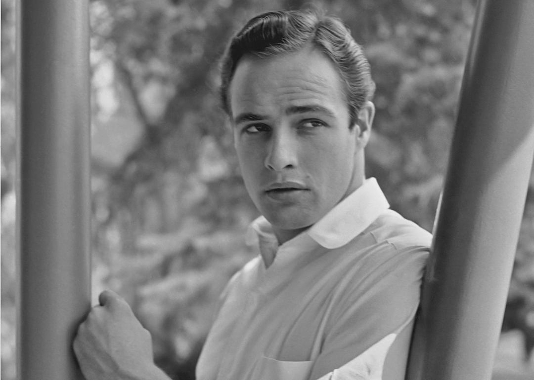 Actor and director Marlon Brando in a white button-down shirt in 1952.
