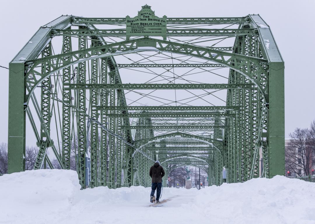 A very snowy view of the historic and restored South Washington Street Bridge in Binghamton, New York.