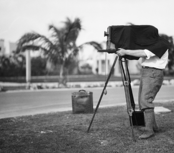 A photographer using a large-format vintage camera in Florida.