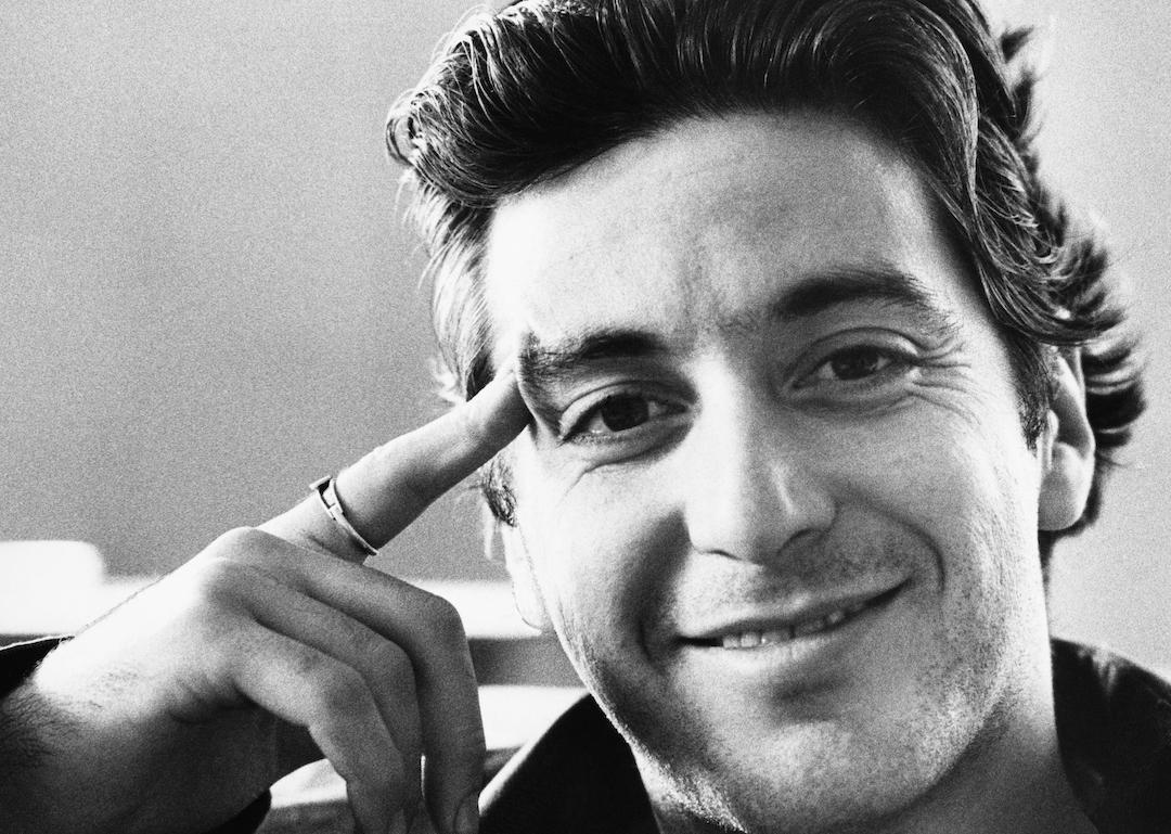 Black and white portrait of actor Al Pacino with his finger on his temple in 1974. 