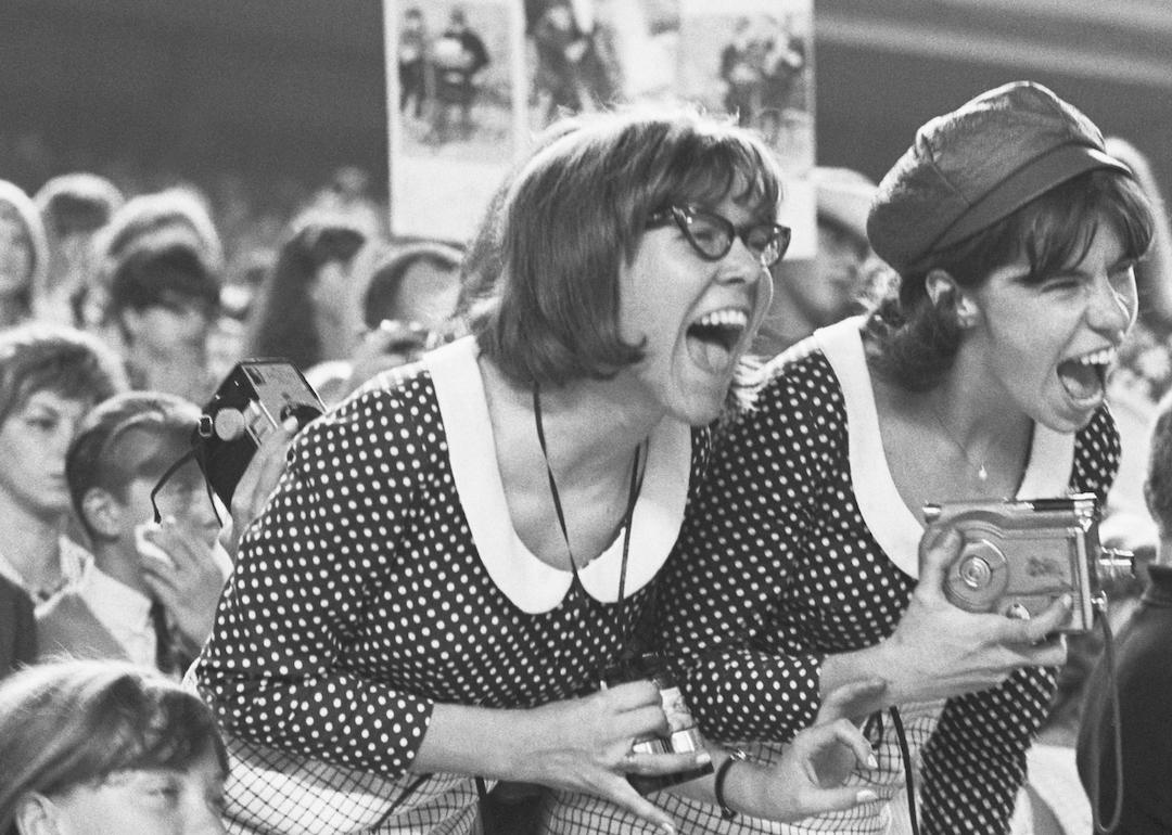 Beatles fans scream at the top of their lungs during a concert at Shea Stadium in August 1965.
