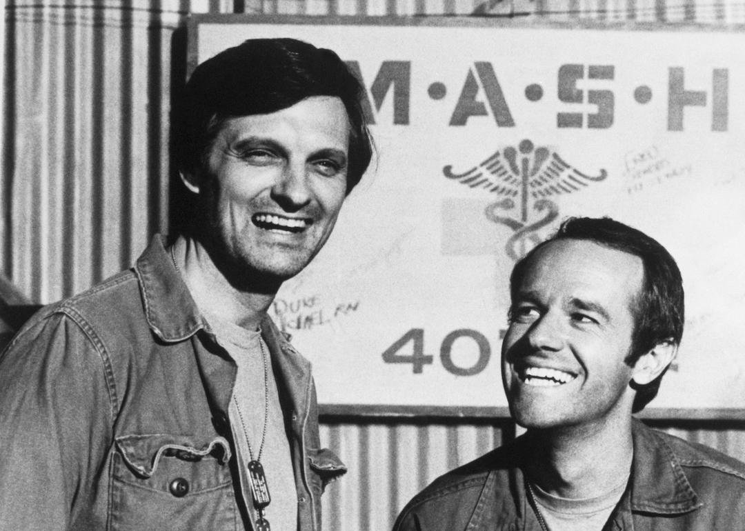 Actors Alan Alda (left) and Mike Farrell (right), cast members of the TV show 'M*A*S*H', circa 1975.